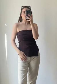 Photo cliente : aucune démarcation visible sous un haut bustier